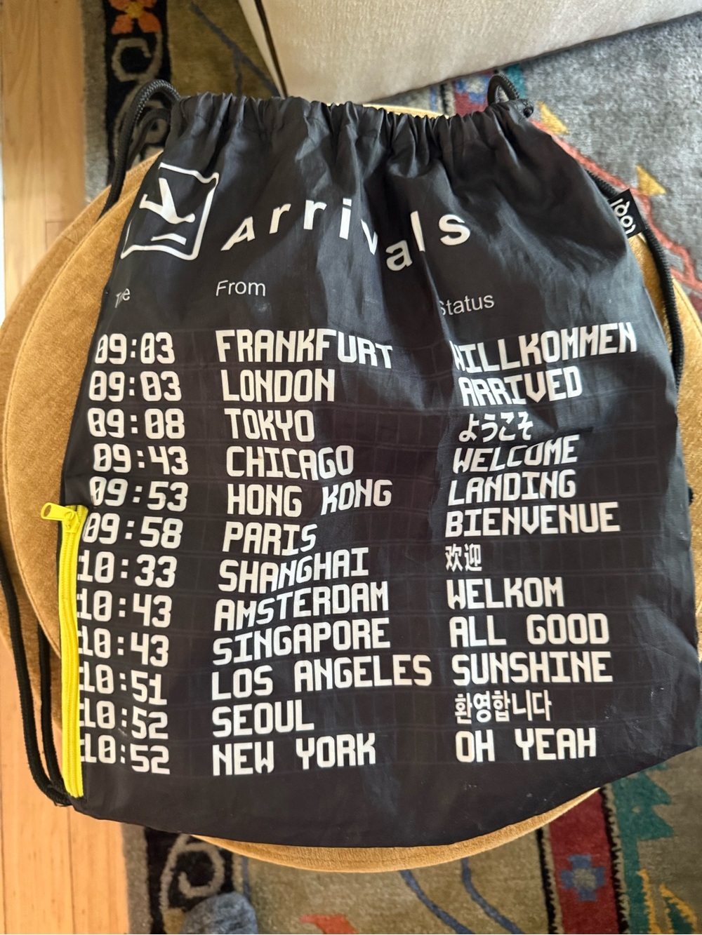 Arrivals and Departures Black Travel Print Drawstring Backpack